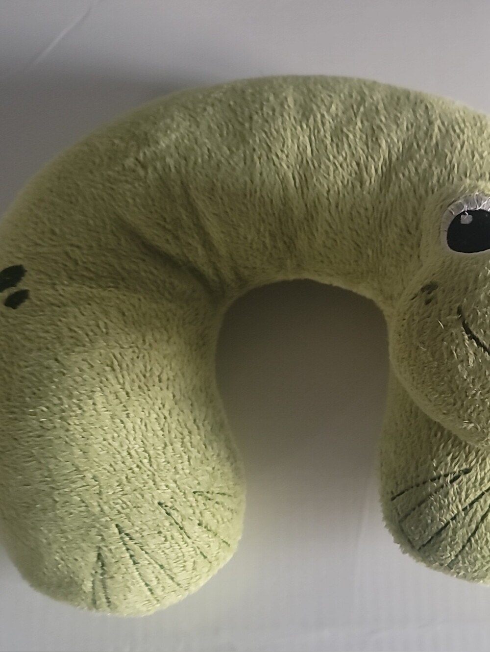 Plush Light Green U-Shaped Neck Pillow with Smiley Design